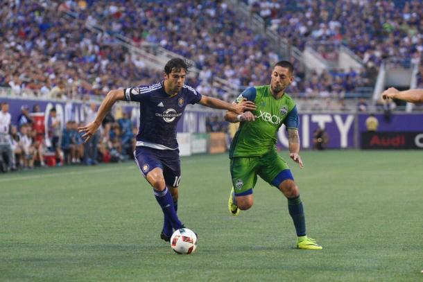 Kaka (left) and Clint Dempsey (right) battle for possession. (Photo: Nick Leyva - The Mane Land)