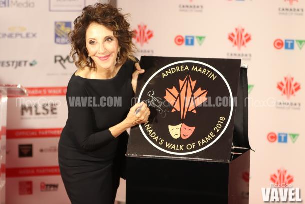 Andrea Martin poses for a photo while signing her star.