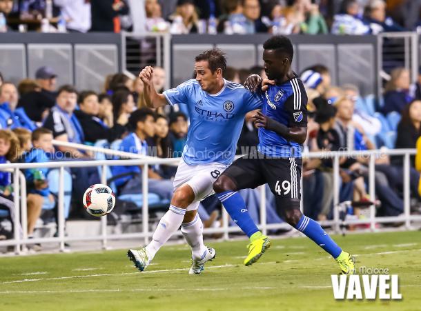 New York City FC midfielder Frank Lampard (8) and San Jose Earthquakes forward Simon Dawkins (49) complete for a through ball during the first half of play.