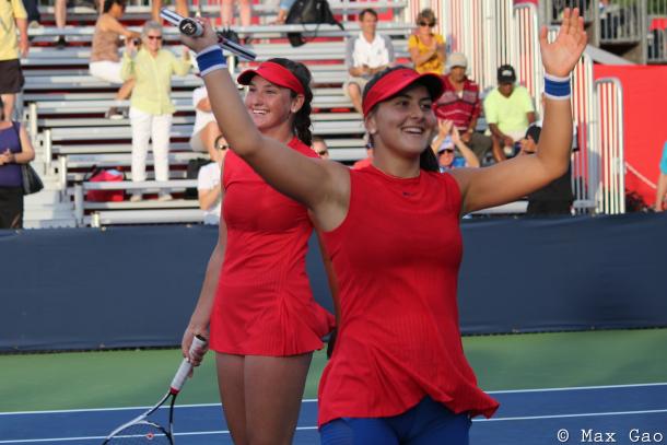 The future of Canadian tennis: Canadians Carson Branstine and Bianca Andreescu wave to the crowd after their thrilling three-set victory over Kristina Mladenovic and Anastasia Pavlyuchenkova in the first round of the 2017 Rogers Cup. | Photo: Max Gao