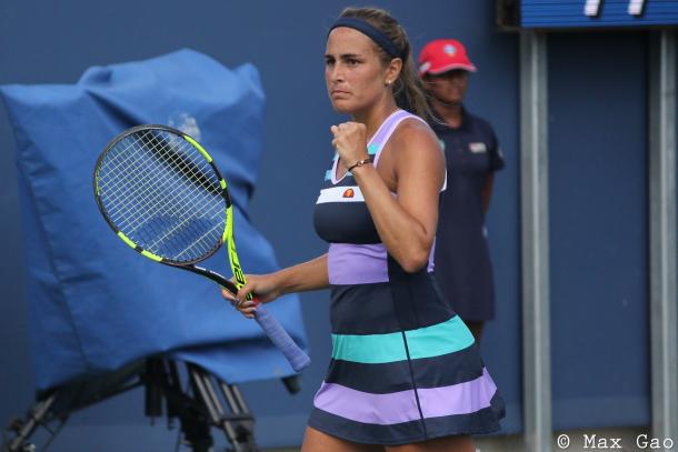 Monica Puig celebrates after winning a point during her final-round qualifying match at the 2017 Western & Southern Open. | Photo: Max Gao