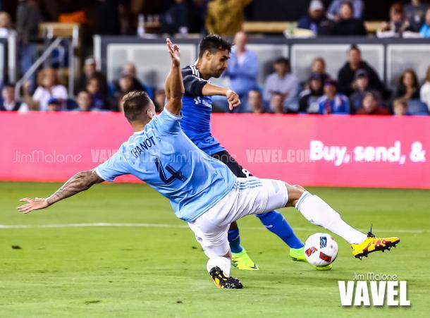 New York City FC Defender Maxime Chanot (4) makes a diving slide to try and block  San Jose Earthquakes forward Chris Wondolowski (8) shot on goal during the second half of play. / Jim Malone – VAVEL USA