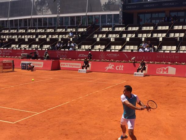 Nicolas Almagro hitting a backhand during his first round match against Benoit Paire. (Pedro Cunha/VAVEL USA)