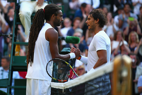 Brown and Rafa Nadal meet at the net after their match at Wimbledon in 2015 (Getty/Ian Walton)