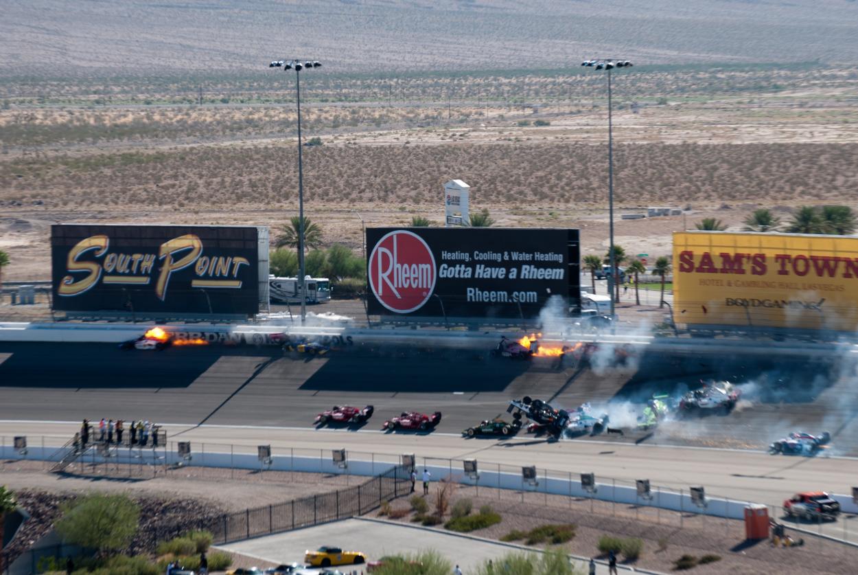 The crash in the 2011 IZOD IndyCar World Championship that killed Dan Wheldon By Eje Gustafsson from USA - Horrible Indycar crash Las Vegas, CC BY 2.0, https://commons.wikimedia.org/w/index.php?curid=17012367  