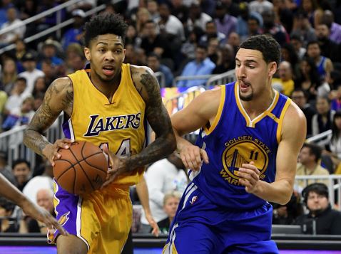 Brandon Ingram (left) drives to the basket as Klay Thompson tries to stop him | Source: Ethan Miller - Getty Images