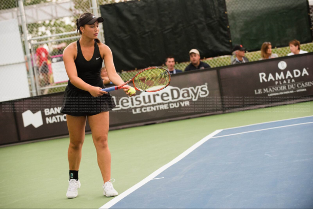 Isabelle Boulais prepares to serve. | Photo: Dominic Charette Photography