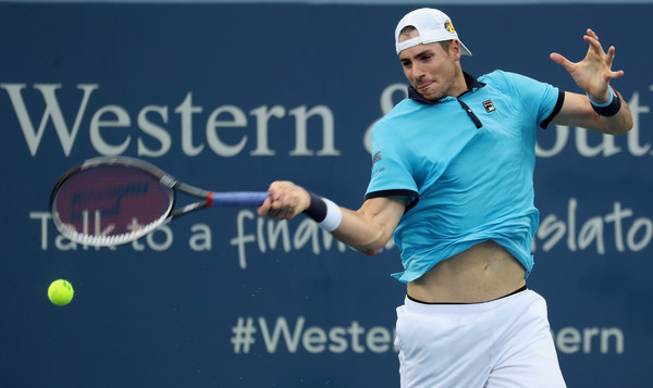 Isner cracks a forehand during his third round win. Photo: Rob Carr/Getty Images