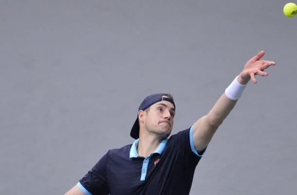 Photo: Aurelien Meunier/Getty Images-John Isner serving.