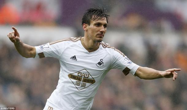 Cork celebrates his goal. | Image source: Reuters