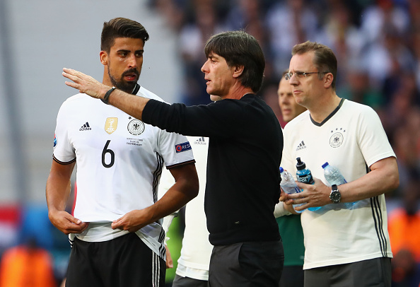 Löw talks Sami Khedira through the next phase of play. | Image credit: Alexander Hassenstein/Getty Images