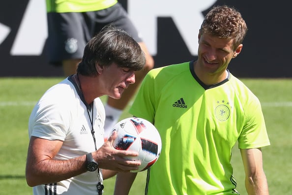 The coach jokes around during training. | Image credit: Alexander Hassenstein/Getty Images