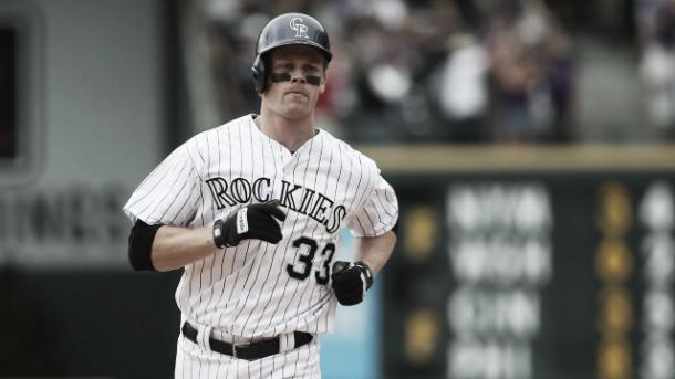 Justin Moreau rounds the bases at Coors Field in Denver, Colorado | David Zalubowski - AP)