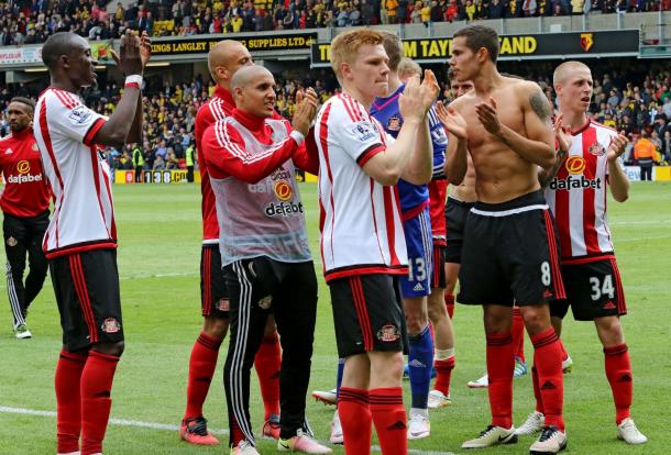 Robson (far right) applauds the travelling fans with his senior teammates at full time. (Photo: Getty)