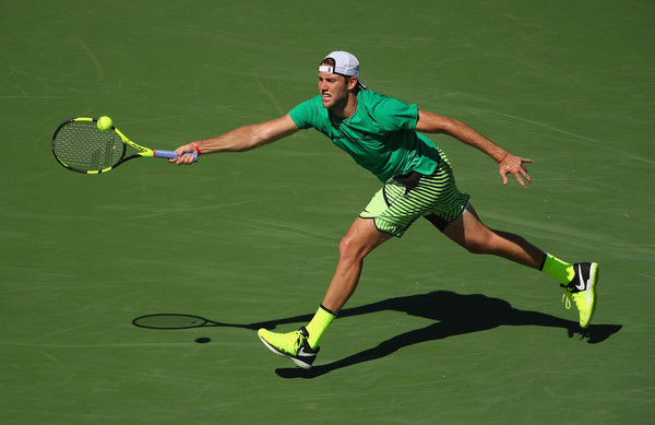 Jack Sock runs to hit a forehand during his straight-sets defeat to Roger Federer in the semifinals of the 2017 BNP Paribas Open. | Photo: Clive Brunskill/Getty Images