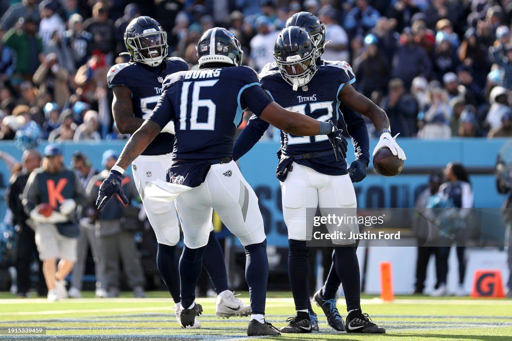 Tyjae Spears #32 of the Tennessee Titans celebrates a touchdown with teammates during the second quarter against the Jacksonville Jaguars at Nissan Stadium on January 07, 2024 in Nashville, Tennessee. (Photo by Justin Ford/Getty Images)