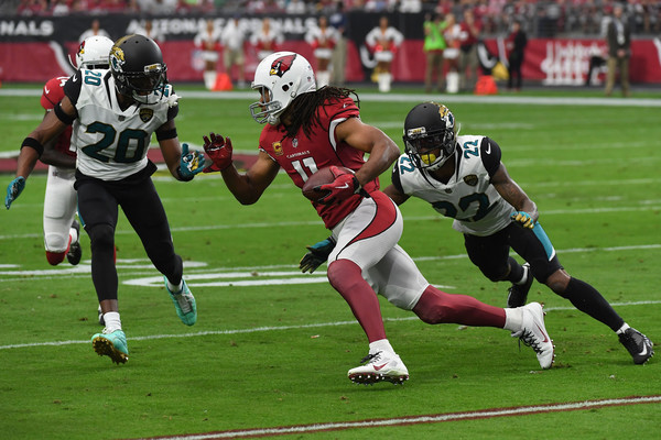 Jalen Ramsey #20 and Aaron Colvin #22 of the Jacksonville Jaguars close in on Larry Fitzgerald #11 of the Arizona Cardinals. |Source: Norm Hall/Getty Images North America|