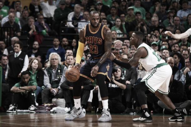 LeBron James looks to attack against Terry Rozier. Photo: Brian Babineau/NBAE/Getty Images