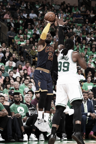 LeBron James shoots over Jae Crowder. Photo: Brian Babineau/NBAE/Getty Images