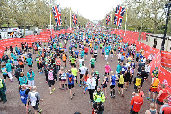 Runners walk down part of The Mall after completing the 26.2 miles race (Getty/Jeff Spicer)