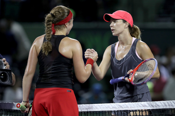 Ostapenko and Collins met for a warm handshake after the match today | Photo: Matthew Stockman/Getty Images North America