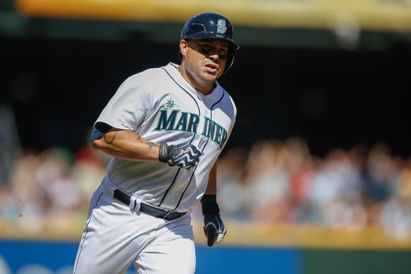 Humberto Quintero #35 of the Seattle Mariners rounds the bases after hitting a two-run homer against the Toronto Blue Jays in the fifth inning at Safeco Field on August 7, 2013 in Seattle, Washington. The Mariners defeated the Blue Jays 9-7. (Aug. 6, 2013 - Source: Otto Greule Jr/Getty Images North America)