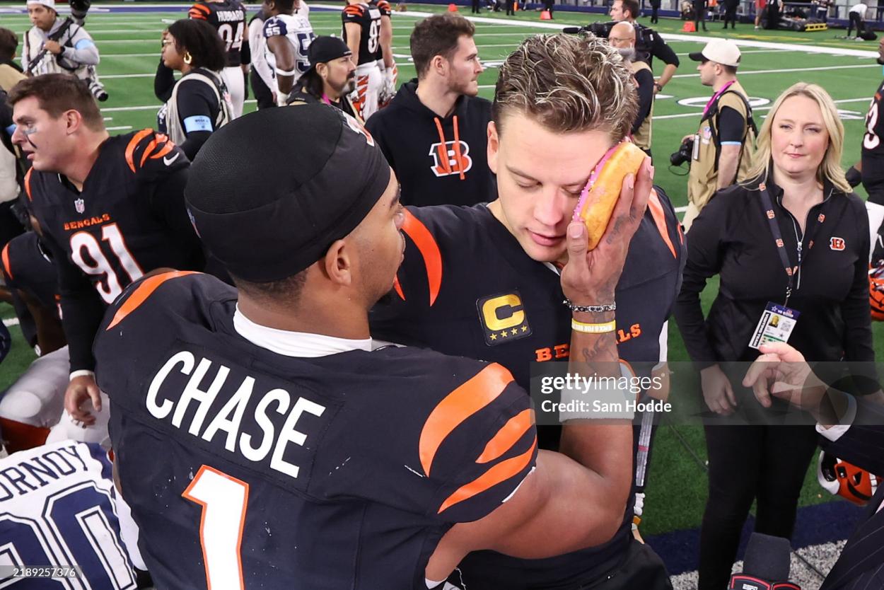 Joe Burrow and Ja'Marr Chase celebrate after victory against the Dallas Cowboys. Photo by Sam Hodde/Getty Images)