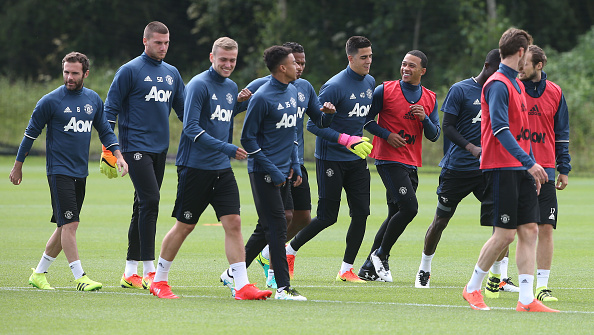 James Wilson (3rd left) was back in United training | Photo: Matthew Peters/Man Utd