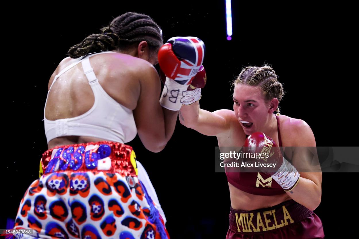 LIVERPOOL, ENGLAND - JANUARY 20: Mikaela Mayer punches Natasha Jonas during the IBF World Welterweight Title fight between Natasha Jonas and Mikaela Mayer at M&S Bank Arena on January 20, 2024 in Liverpool, England. (Photo by Alex Livesey/Getty Images)