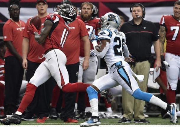 Julio Jones making one of his 12 catches against the Carolina Panthers | Source: Rainier Ehrhardt - AP Photo