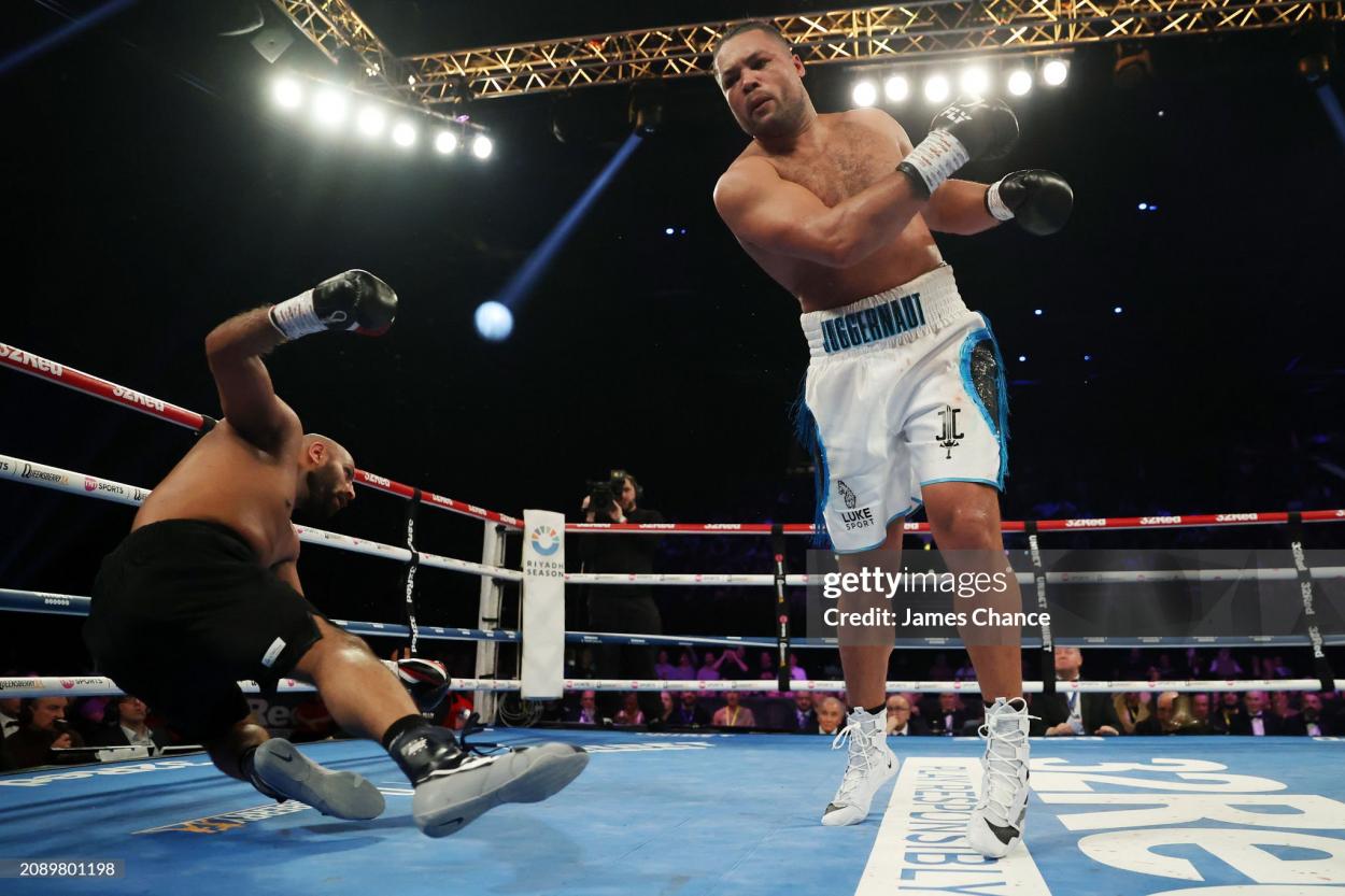 BIRMINGHAM, ENGLAND - MARCH 16: Kash Ali is knocked down by Joe Joyce in the Heavyweight fight between Joe Joyce and Kash Ali at Resorts World Arena on March 16, 2024 in Birmingham, England. (Photo by James Chance/Getty Images)