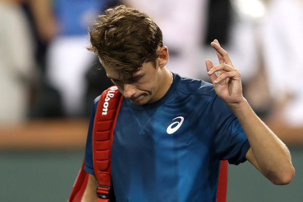 Alex de Minaur looking dejected while walking off Stadium 1 for the first time in his career | Photo: Matthew Stockman/Getty Images North America