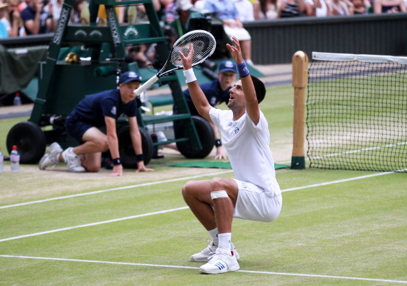 Djokovic broke through on the grass in 2011, claiming his first Wimbledon title. Credit: Julian Finney/Getty Images