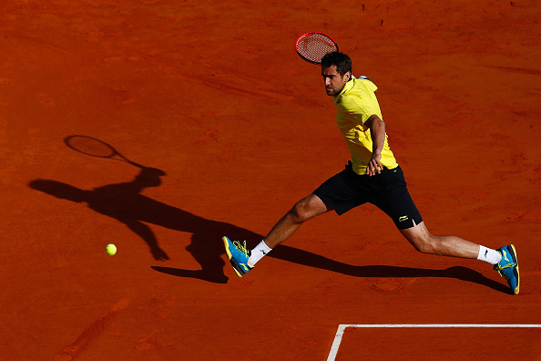 Cilic runs down a forehand at the 2015 Monte Carlo Rolex Masters against Florian Mayer of Germany. Credit: Julian Finney/Getty Images