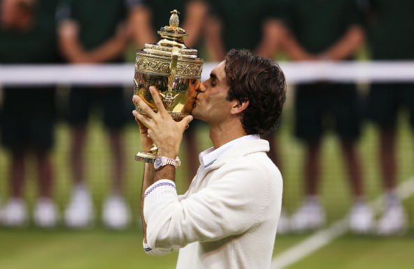 Federer with the Wimbledon trophy in 2012 (Getty/Julian Finney)