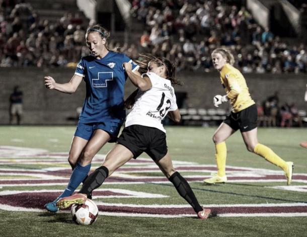 Julie King managing to defend USWNT player Alex Morgan | Source: Mike Gridley