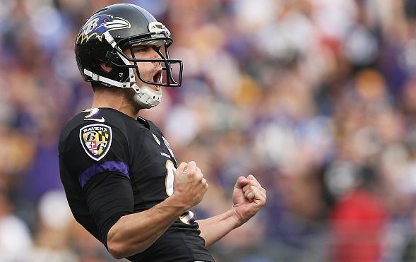 Justin Tucker celebrates after converting a field goal against the Pittsburgh Steelers | Patrick Smith - Getty Images