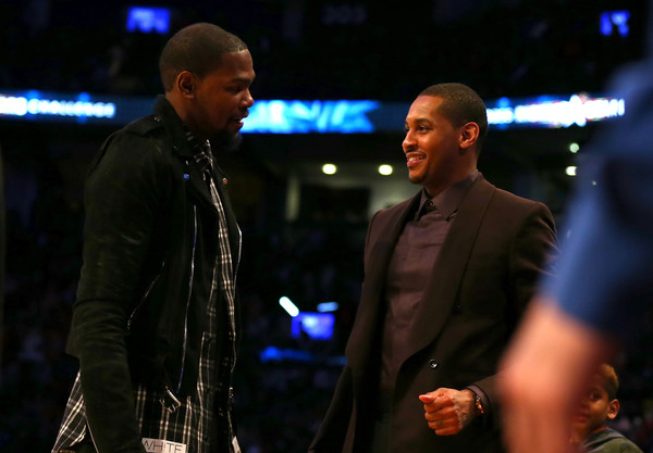 Kevin Durant and Carmelo Anthony speak during at halftime at 2016 Rising Stars Challenge/Elsa-Getty Images 