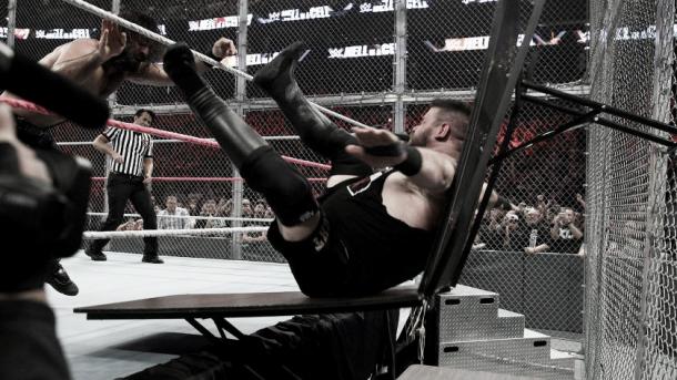 KO was sent crashing through two tables. Photo- WWE.com