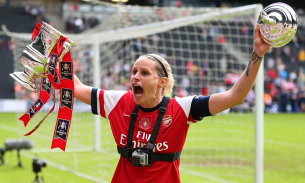 Smith celebrates lifting the FA Women's Cup. | Image source: The Guardian