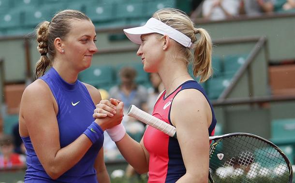 Kvitova and Julia Boserup (right) embrace each other at the net after the conclusion of their match at the French Open. Photo credit: Tennis.life.