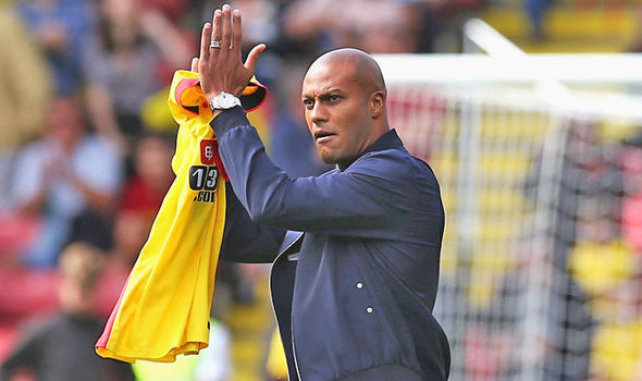 Watford's back three, including new signing Younes Kaboul, struggled against Arsenal's clever movement | picture: Watford FC