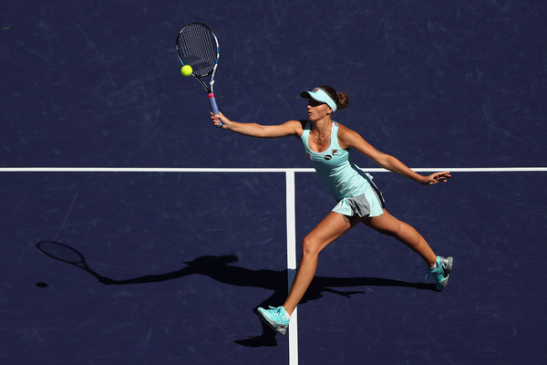 Karolina Pliskova of Czech Republic hits a forehand volley against Daria Kasatkina of Russia during day eleven of the 2016 BNP Paribas Open. | Photo: Julian Finney/Getty Images North America