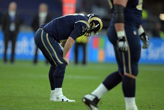 Case Keenum throws four interceptions in London. | Photo: USA Today Sports
