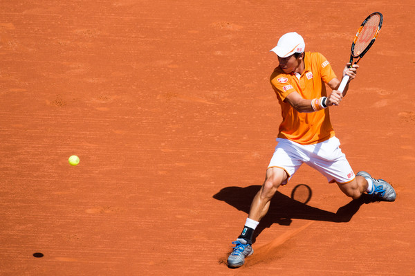 Nishikori hitting a backhand during his match today | Photo: Photo: Alex Caparros/Getty Images  ​