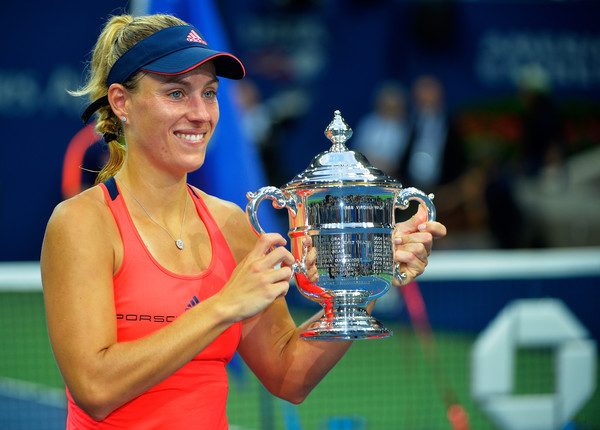Kerber shows off her 2016 US Open trophy. Photo: Alex Goodlett/Getty Images