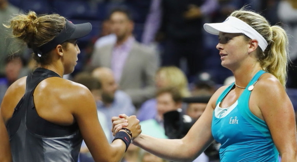 Photo: Al Bello/Getty Images-Madison Keys and Coco Vandeweghe at the net after their semifinal match.