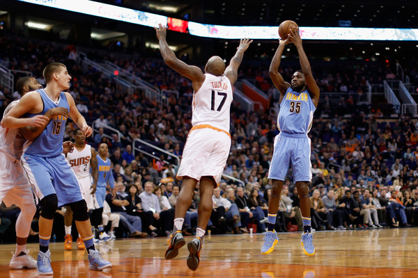 Faried takes a shot against the Suns. Christian Petersen/Getty Images North America