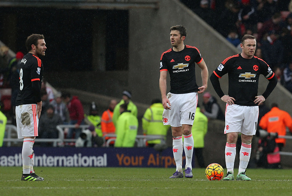 Mata, Carrick and Rooney in frustration after Kone's winner | Photo: Matthew Peters/Manchester United
