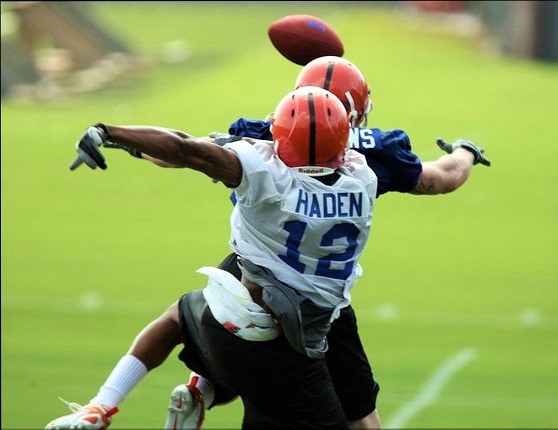 Kile at the University of Florida's spring camp playing against Pro Bowl corner Joe Haden. Photo Source: gatorcounty.com - Timothy Casey